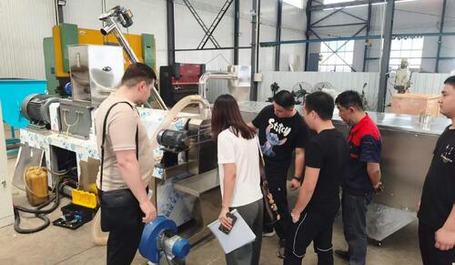A Romanian customer visited our factory and purchased a set of snack extruder machine.
